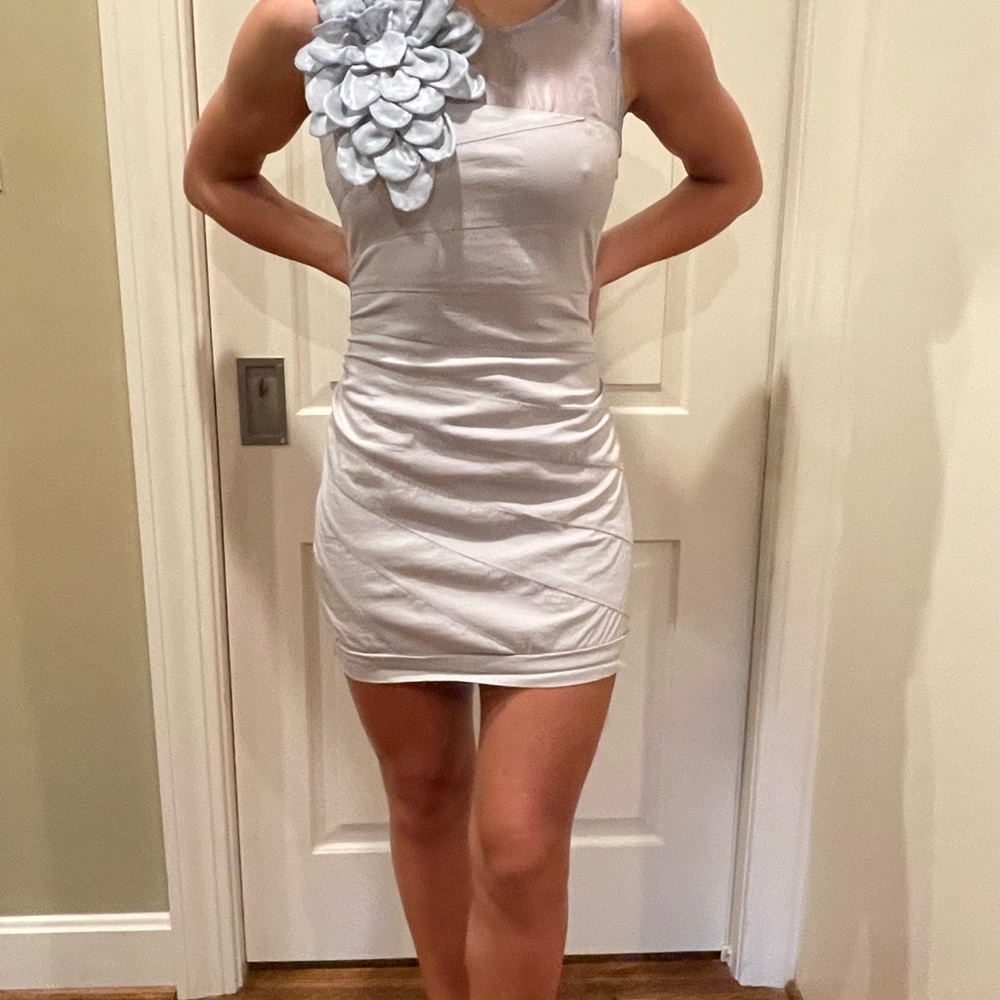 Vintage mini dress with giant flower detail on the shoulder